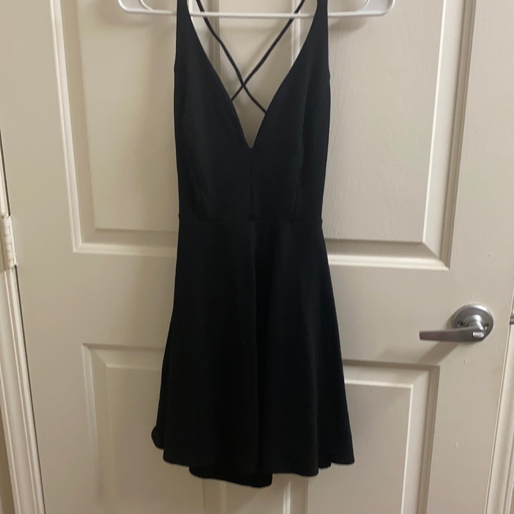 Lulu’s cross back dress. Open back, black, size medium, comfy.